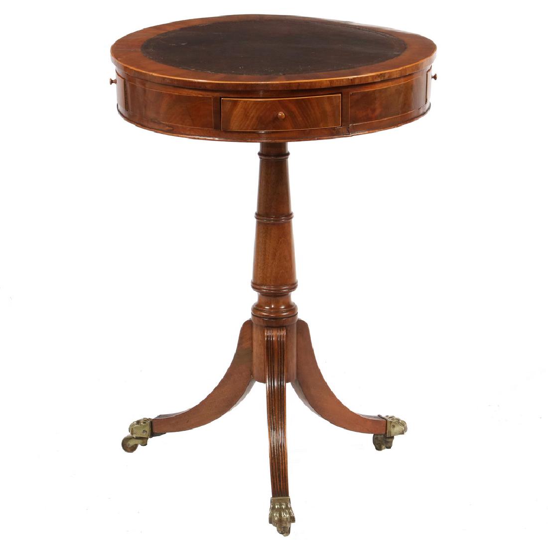 DIMINUTIVE DRUM TABLE: 19th c. Duncan Phyfe Style Mahogany Swivel Top Table with leather top and four small drawers, string inlaid edges, button pulls, ring and urn turned column, tripod base with reeded top scythe legs end