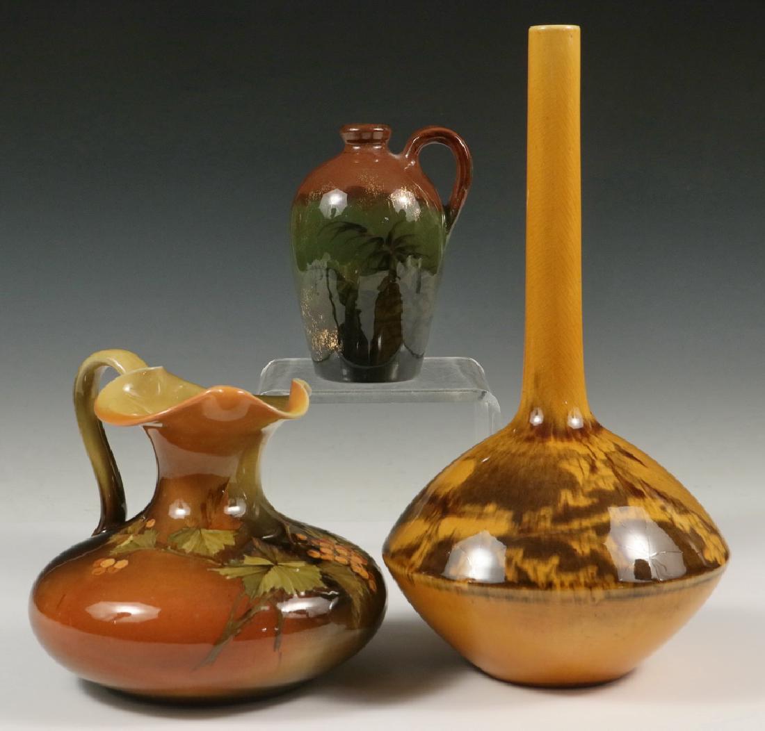 (3 PCS) EARLY ROOKWOOD ART POTTERY: Group of (3) Pieces of Late 19th c. Rookwood Art Pottery, including: Standard glaze ewer by Robert Albert Valentien (worked 1881-1905), with leaf and berry decoration, pre-1900 mark, #490C, incised 'R