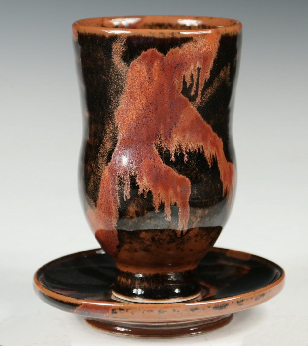 THOMAS BEZANSON (VT, 1929-2007): Porcelain Cup & Saucer with Honan Tenmoku glaze, tall form cup with raised Star of David in round cartouche decoration on one side, on fitted underplate, with glaze painted Brother Thomas' post 1985 m