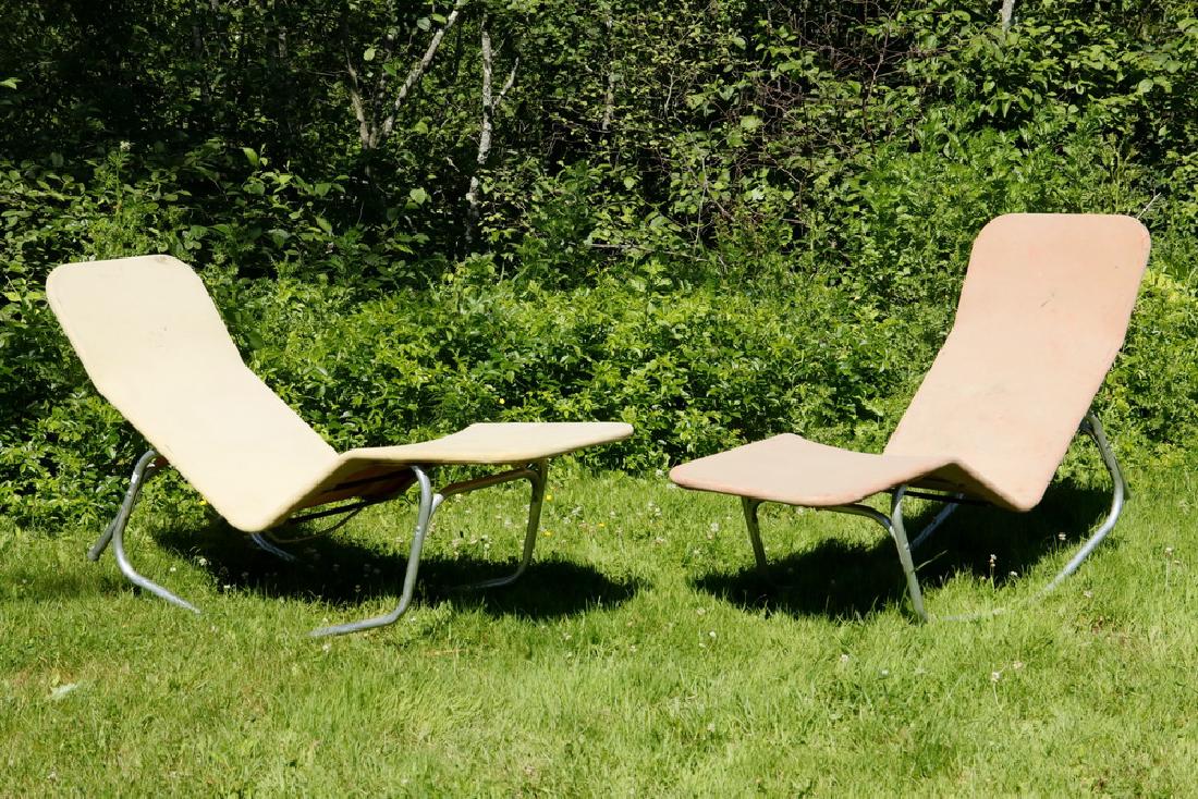 PAIR OF BARTOLUCCI BARWA PATIO LOUNGES: Mid Century Aluminum and Canvas Rocker Lounges, "Barwa" by Edgar Bartolucci (1918-2014) and John Waldheim (1920-2002), introduced in 1947. Roughly, 21" x 34" x 60". Light corrosion to bindings, canvas