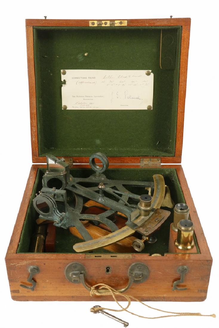 CASED MARINE SEXTANT: Ca. 1920 Mahogany Cased Brass Sextant, marked 'Re-Divided by H. Hughes & Son, Ltd., London', with accessories, brass arc signed 'A. Van Der Voodt, Canal des Brasseurs 34, Antwerp', with National Physi