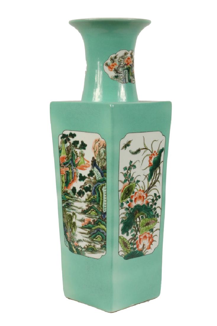 CHINESE GREEN PORCELAIN VASE: Chinese Square Porcelain Vase with flared rim and Kangxi six-character mark on base, decorated with scenic panels depicting qilin & phoenix, flowers & bird, and landscape on green glaze ground, 18 1/4