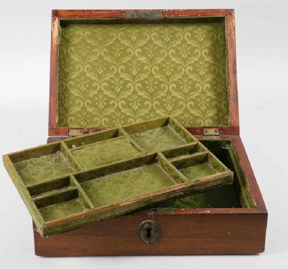 SEWING BOX: 19th c. Sarcophagus Form Wooden Sewing Box, veneer paneled lid, with fitted lift out tray, lined with green damask fabric, brass lock escutcheon (no key), 4 1/4" high, 11" x 7 3/4". Veneer chip in one