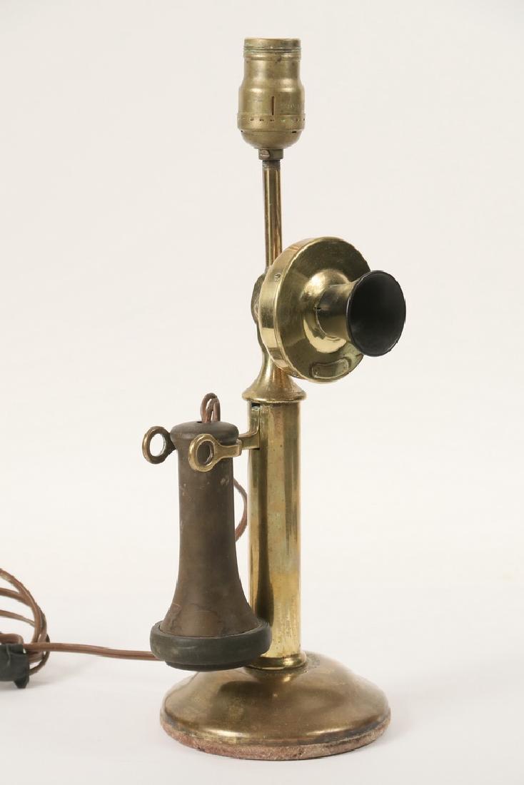 EARLY TELEPHONE AS A LAMP BASE: Candlestick or Butter Stamp Telephone in brass by Western Electric, model 323W, stamped with 1913 patents, having gutta percha mouth and ear pieces, 11 1/2" tall phone, 16" to top of socket. Good cond