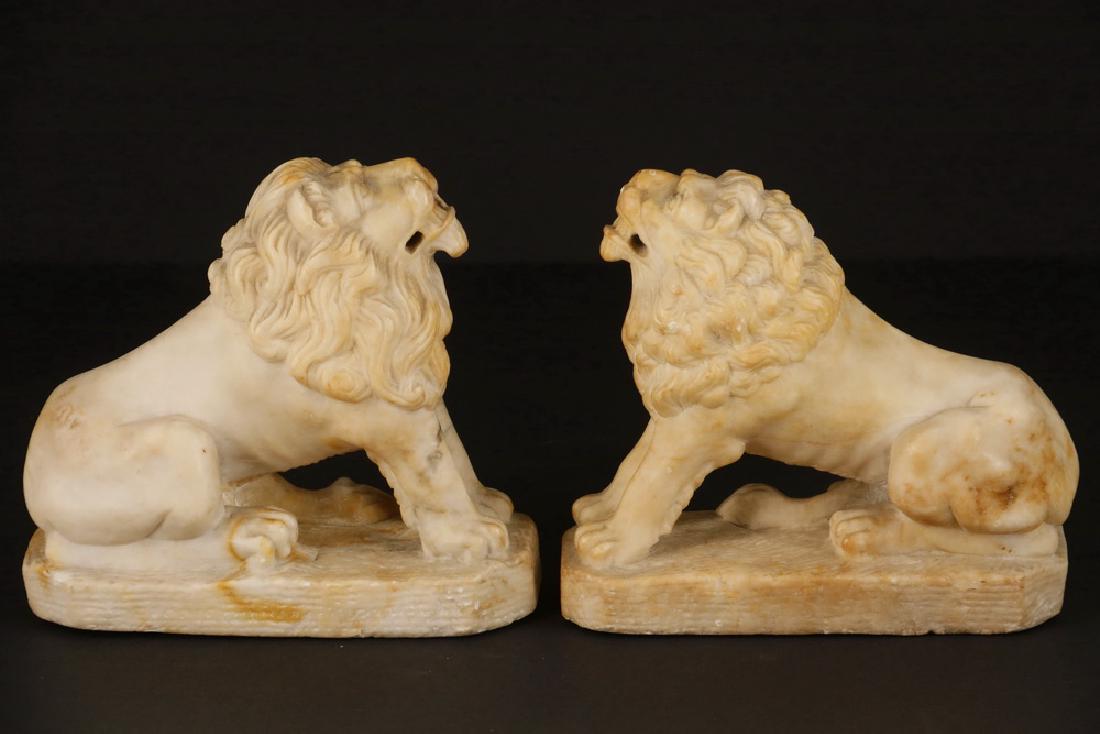 PAIR CARVED STONE LIONS (1 of 2)