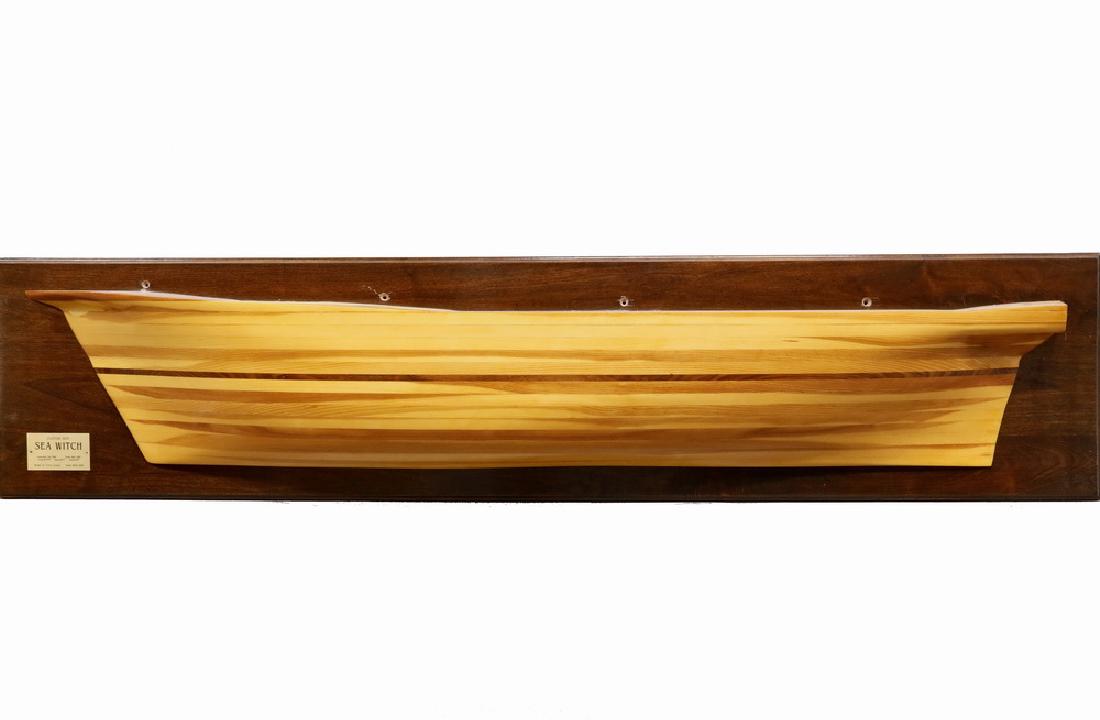 LARGE SHIP HALF HULL: Contemporary Model with tag that reads "Clipper Ship "Sea Witch", launched Dec. 1846, length: 170'-3", beam: 33'-11", depth 19'-0", Sunk Mar 1854. Model by Terry Jewett, built 2003-2005". Roughly 73"