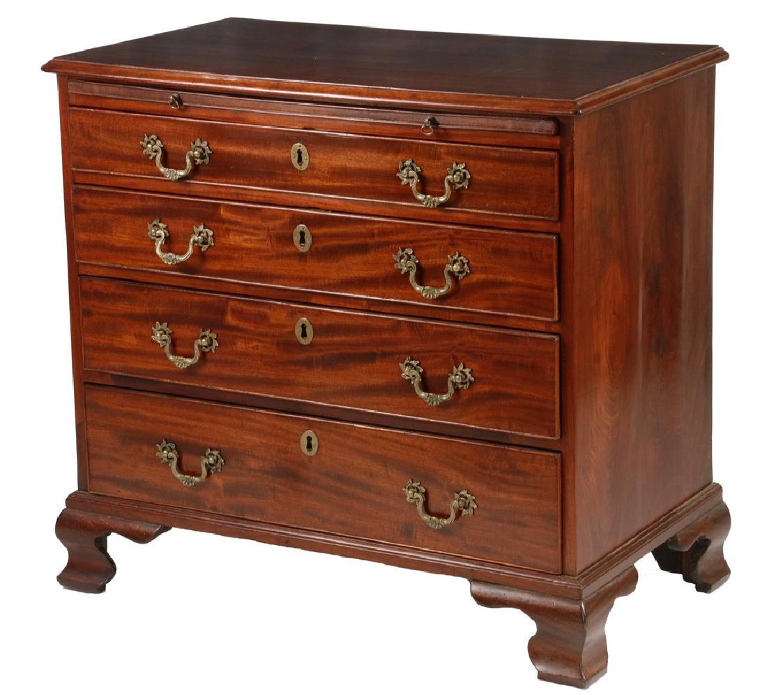 GEORGIAN GENT'S CHEST: English George III Period Mahogany Gent's Chest, with pull out work shelf and what appears to be original Rococo form brasses, on bold ogee footed applied base, 31 1/2" high, 33" x 18 1/2". Minor old 