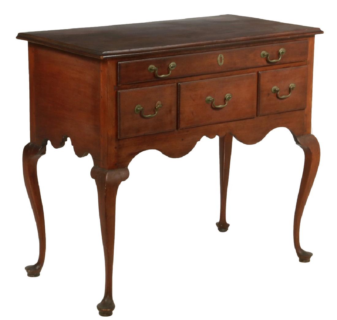 AMERICAN COLONIAL LOWBOY: Late 18th c. New England Queen Anne Mahogany Lowboy, in the original finish, retaining the original post and bail brass hardware, having an overhanging molded top, one over three molded edge drawers,