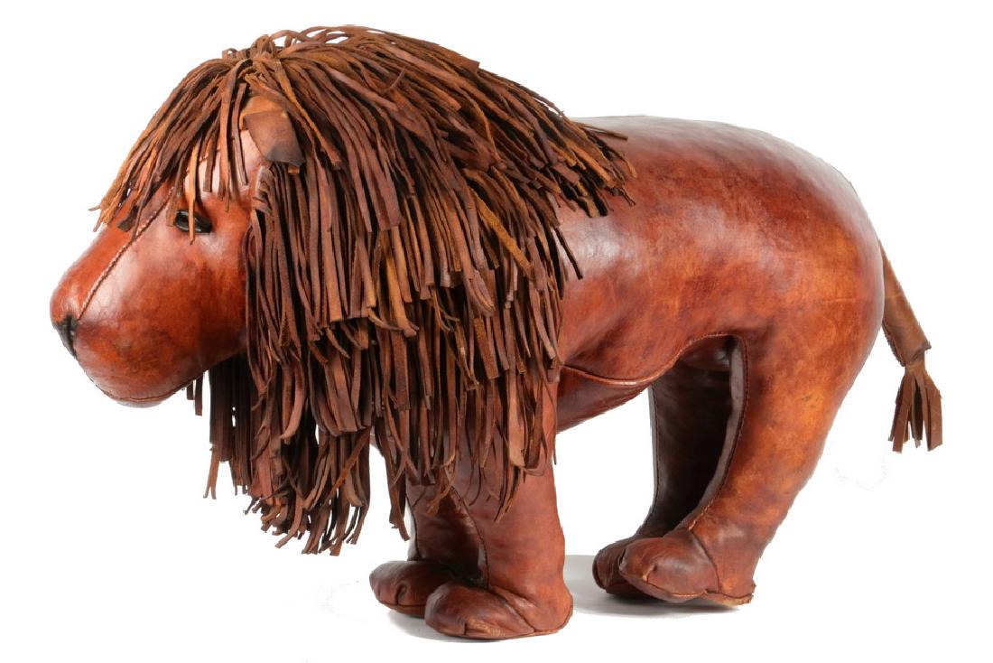 OMERSA & COMPANY LION OTTOMAN: English Leather Lion Form Footstool by (Dmitri) Omersa & Company, ca. 1970s, in chocolate brown leather with nice patina, curled leather eyes, 18" high, 30 1/2" x 12". Losses to edges and bottom of fe