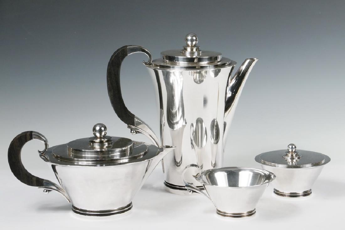 (4 PC) GEORG JENSEN TEA & COFFEE SERVICE: (4) Piece Georg Jensen Danish Sterling Silver Pyramid Pattern Beverage Service, No. 600, ca. 1960, designed by Harald Nielsen in 1930, stepped design with ball finials, ebony handles, all pieces with
