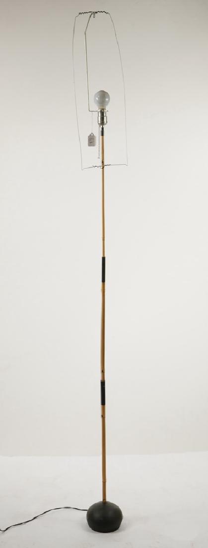 ISAMU NOGUCHI MIDCENTURY FLOOR LAMP: "Akari Light Sculpture" (E-47927 Floor Lamp) designed by Isamu Noguchi (1904-1988) in 1951, made by the original manufacturer in Gifu, Japan, of slender bamboo on a small black weighted base, having a