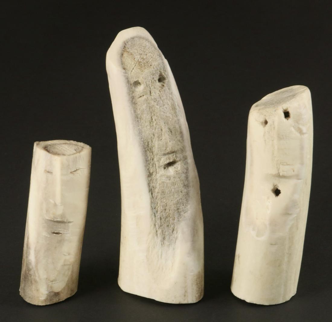 ELIZABETH NUTARULUK AULATJAT: (3) Inuit Antler Dolls, with simple human visages, 2 3/4" to 4 1/2". Good condition.