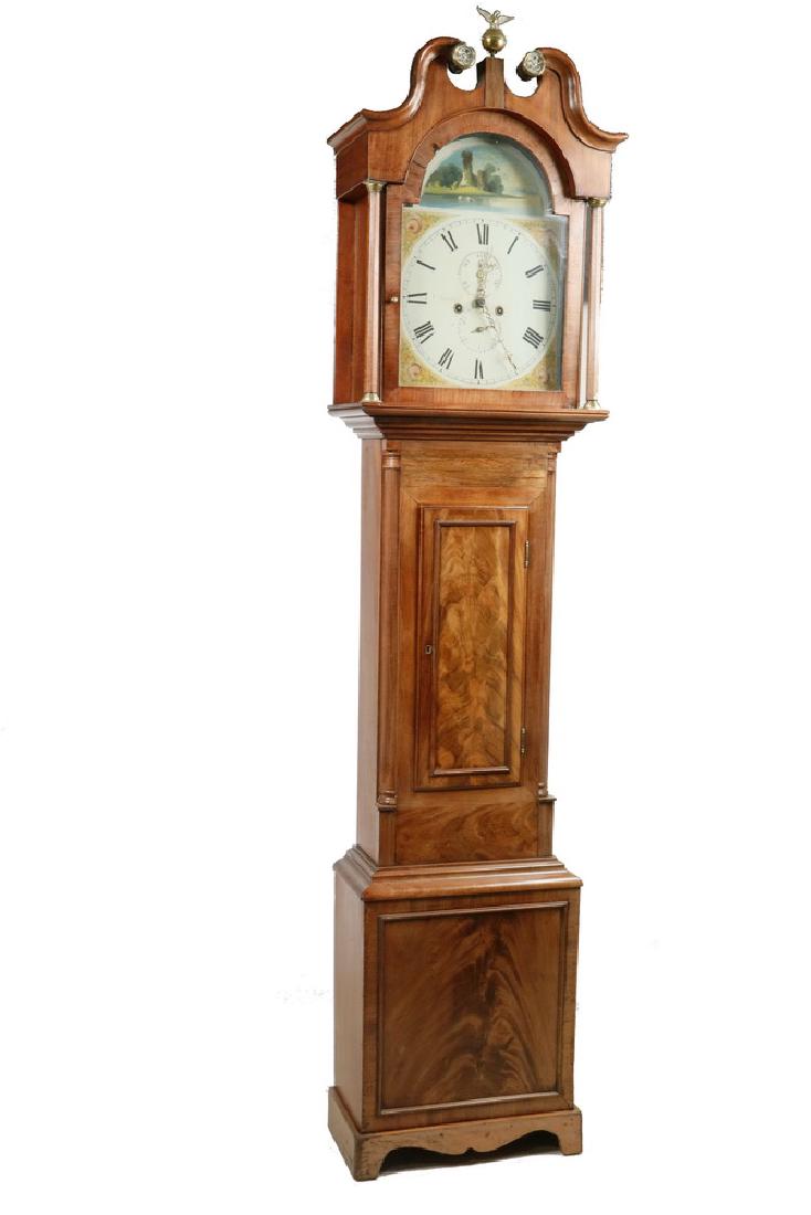 18TH C. SCOTTISH TALL CASE CLOCK: Grandfather Clock in figured crotch split mahogany by John Robertson of Potterrow Port, Edinburgh circa 1785, having a broken arch pediment centered on a brass eagle, flanked by brass rosettes, arched