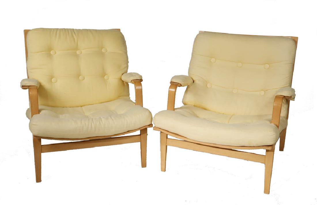 PAIR OF SWEDISH MODERN ARMCHAIRS BY MATHSSON: "Ingrid" Easy Chairs in bent beechwood and cotton, by Bruno Mathsson (Swedish, 1907â€“1988), from a 1969 design, marked on lower back stretcher with faux signature and "By DUX", 15" seat, 21" arm
