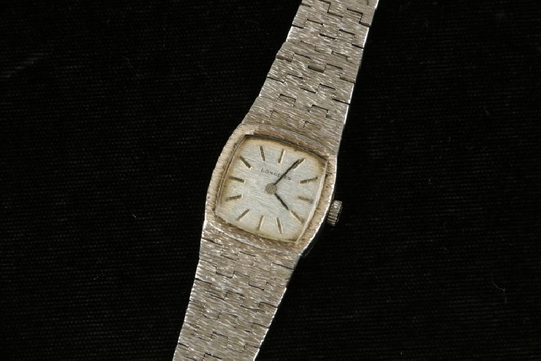 LADY'S LONGINES WRISTWATCH: Vintage Longines Sterling Silver Wristwatch, marked '925', link band with UK import hallmarks and 1975 date letter, head: 3/4" x 7/8", 1.35 ozt tw. Not running, stored in a safety deposit box for many