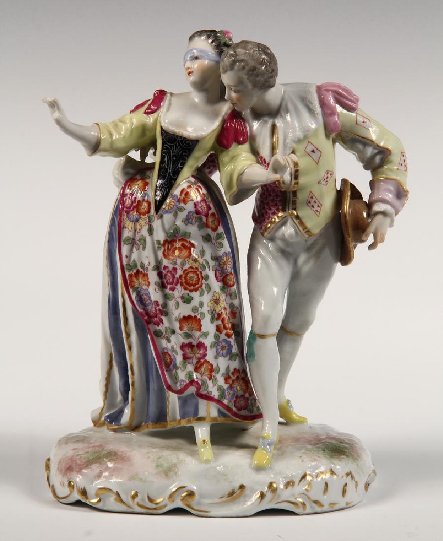 PORCELAIN FIGURINE (1 of 3)