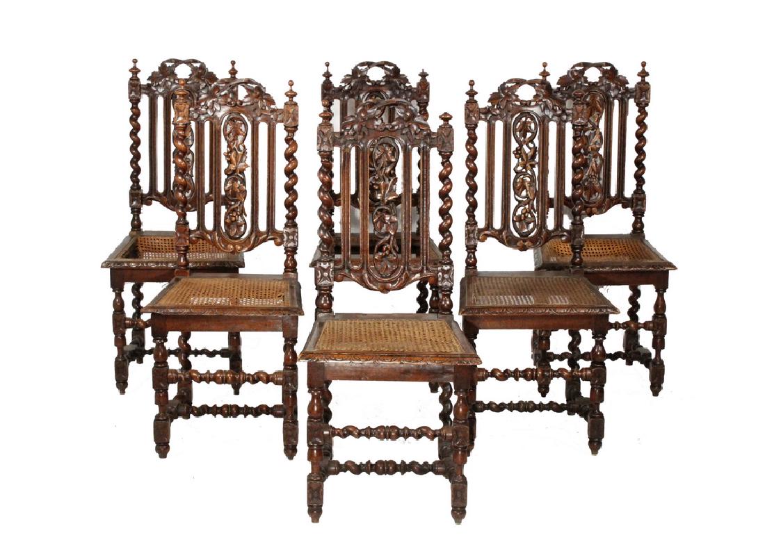 (SET OF 6) ENGLISH OAK DINING CHAIRS: Victorian Dark Oak Country Dining Chairs in carved oak with caned seats, having grapevine carved rail and backsplat, barley twist stiles with finials, chip carved seat frame, barley twist and block le