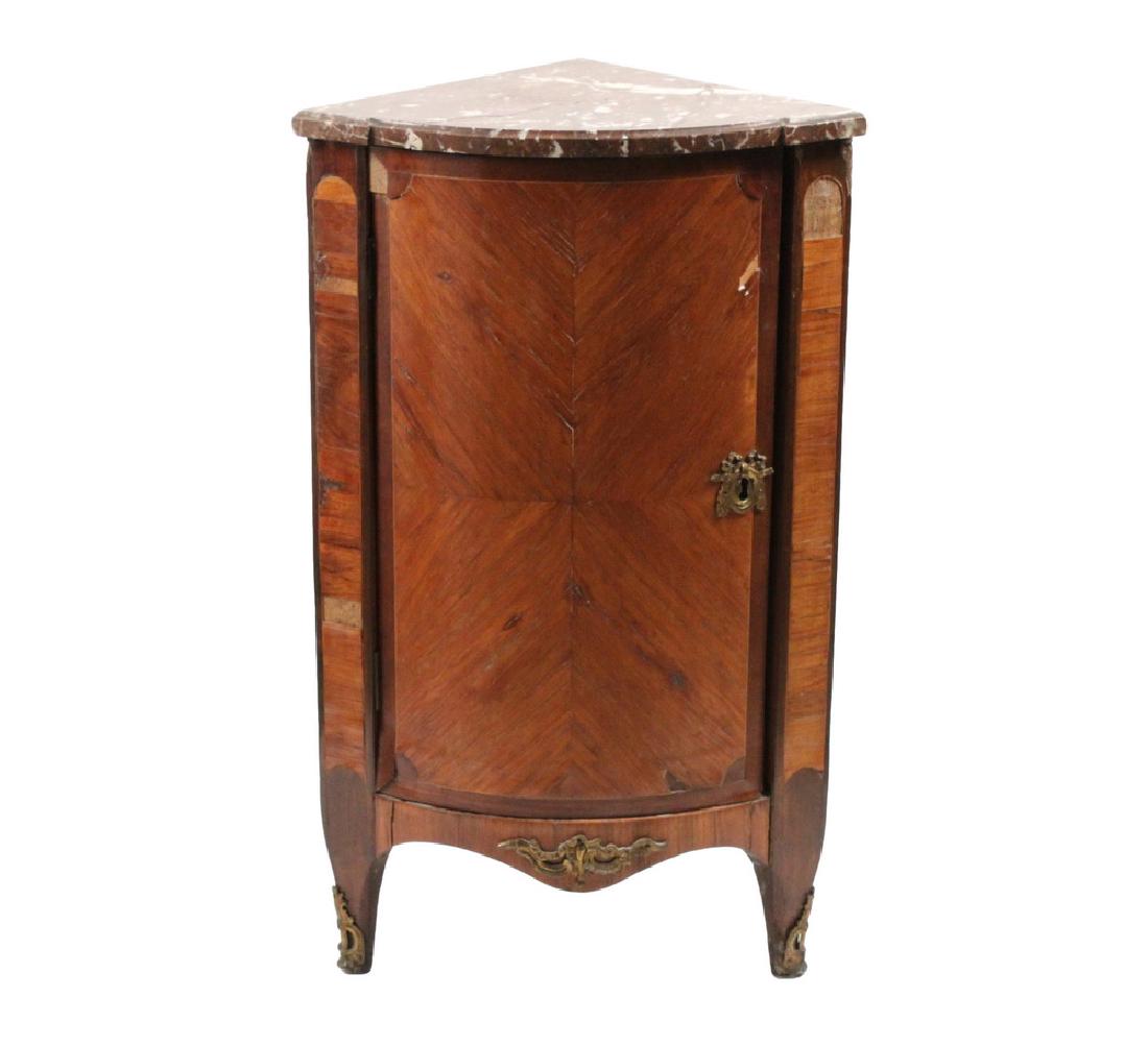 18TH C. FRENCH MARBLE TOP CORNER CABINET: Louis XVI Small Bowfront Corner Cabinet in kingwood veneer, with conforming molded pink marble top, heavy locking door (no key), two shelf interior, having ormolu lock escutcheon, apron mount and leg 