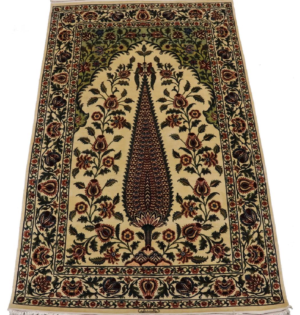 KASHAN PRAYER RUG - 4'-6" x 7'-2": Fine Custom Workshop Rug, made in Lahore, Pakistan, late 20th c., a large cypress tree sits under the ivory mihrab flanked by blossoming vines, in sky blue, teal, gold, red, green and royal blue, on a