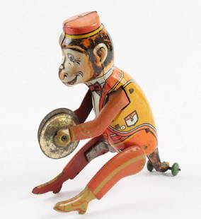 MARX "HOPPO THE WALTZING MONKEY WITH CYMBALS": Key Wind Tin Litho Monkey Toy by Louis Marx Company, ca. 1920s-30s, 8 3/4" high, 6 1/2" x 2 1/2". Works intermittently, no box.