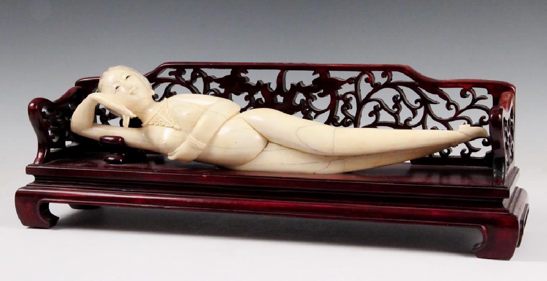 LARGE 19TH C. MEDICAL CHINESE LADY'S MODEL: Qing Dynasty Carved Figure of Reclining Nude Woman, on a later rosewood bed, used by Chinese Doctors for female patients to point out their discomforts. The figure is 21 1/4" long, 8" x 23 1/2" x 6" b