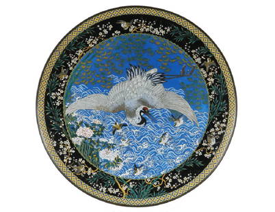 JAPANESE CLOISONNE CHARGER: Monumental Japanese Meiji Period Cloisonne Charger, late 19th c., top surface with image of a crane flying above the waves and with smaller birds below, surrounded by a panel of bamboo, cherry blossom