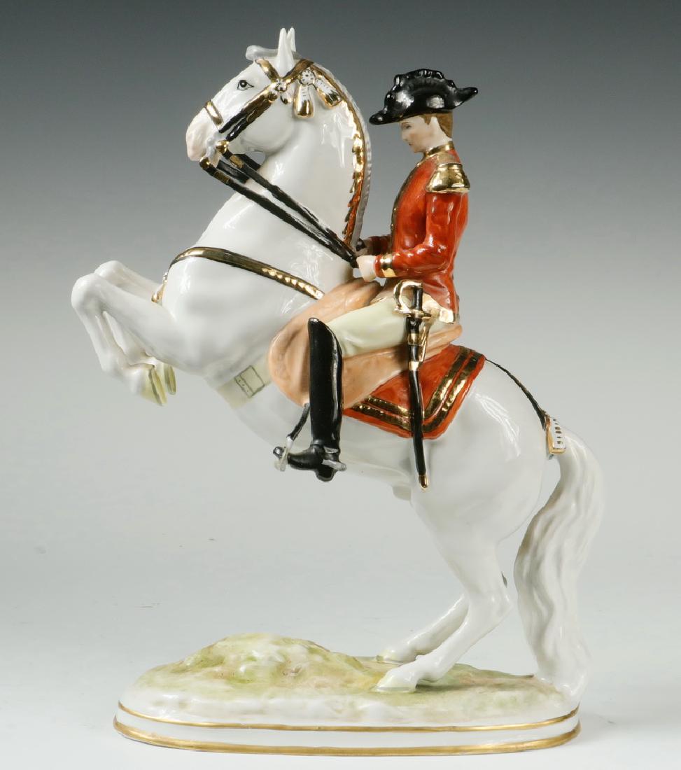 GERMAN PORCELAIN FIGURINE: Lipizzan Horse and Rider Porcelain Figurine by Karl-Heinz Klette, Kups, Bavaria, 1962-1990, #518, depicting the Courbette movement taught at the Spanish Riding School, Vienna, with black printed crown
