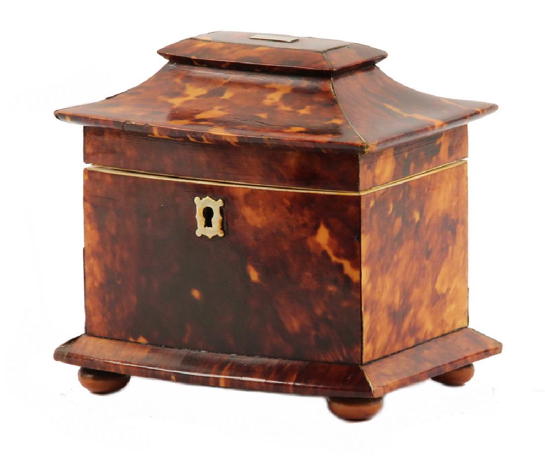 TORTOISESHELL TEA CADDY: Petite 19th c. English Pagoda Shape Tortoiseshell Tea Caddy, bow front shape with pewter stringing and bone edging, silver lid cartouche and lock escutcheon (no key), base skirt, button form feet, vel