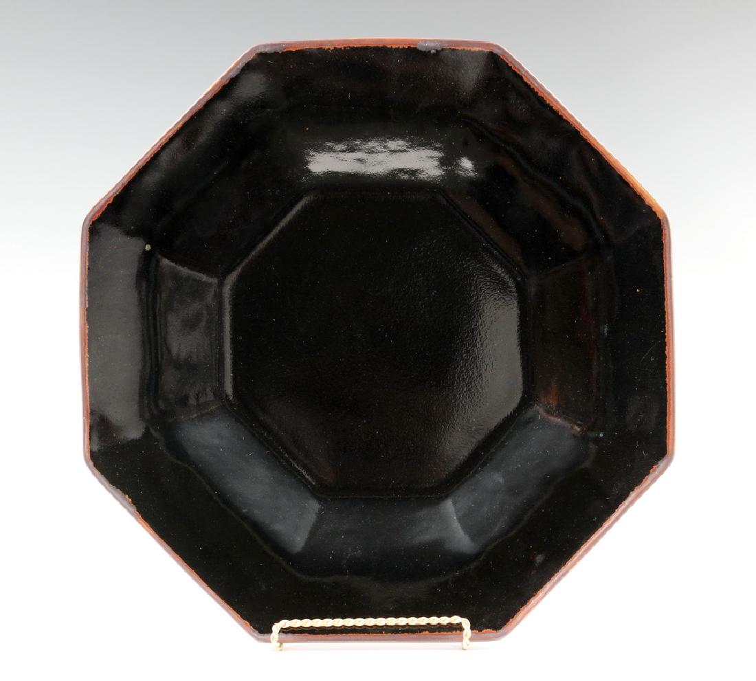BROTHER THOMAS BEZANSON (CANADA/VT, 1929-2007): Large Octagonal Porcelain Platter by Brother Thomas Bezanson, with Honan Tenmoku glaze, incised on base 'Benedictine Monks, Weston, VT' and his cypher mark from the 1970s, 16 3/8" diam. Good condition