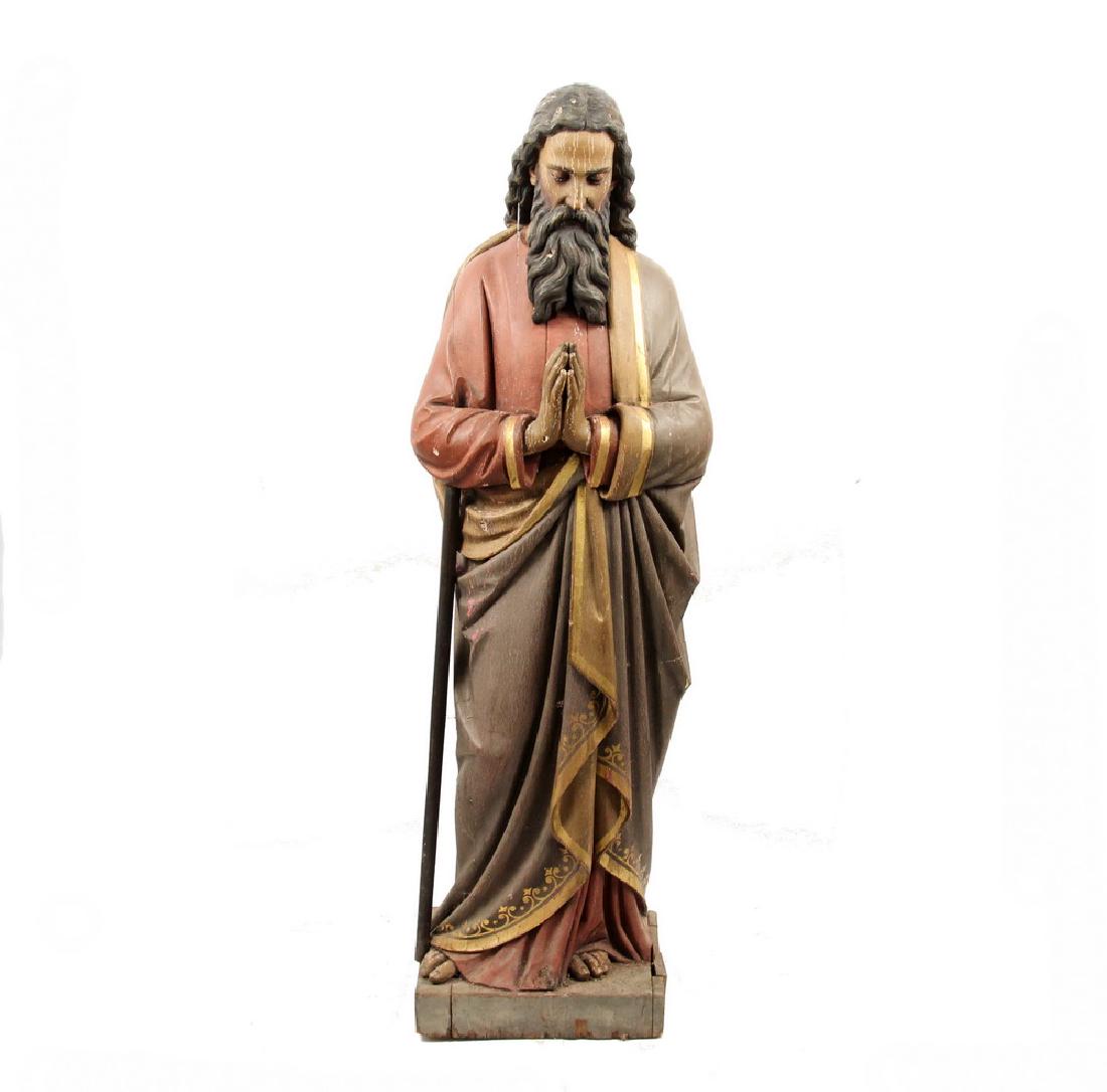 SAINT STATUE: 19th c. Carved and Painted Wooden Saint Thomas, attributed to Henry S. Schroeder, circa 1880, Cincinnati, Ohio, in the German tradition, standing with hands in prayer, with long beard, in red robe wit