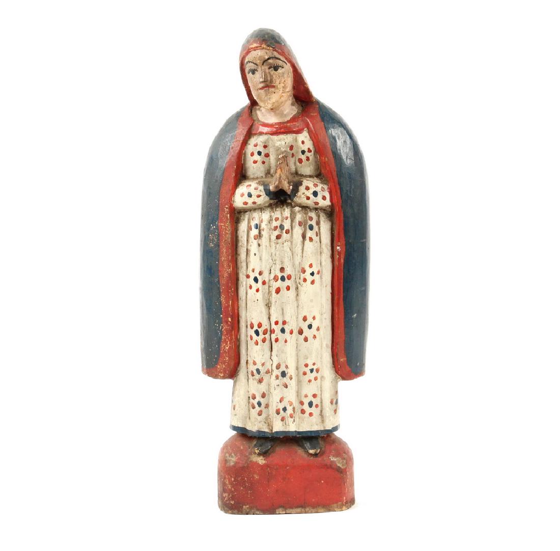 EARLY 20TH C. PUERTO RICAN POLYCHROMED SANTOS: Standing Figure of the Madonna, in red, white and blue robes with a lively dot pattern on the inner gown, 14 1/2" tall. Includes 1953 catalog from "Santos from Puerto Rico", a Cooper Union exhibition 