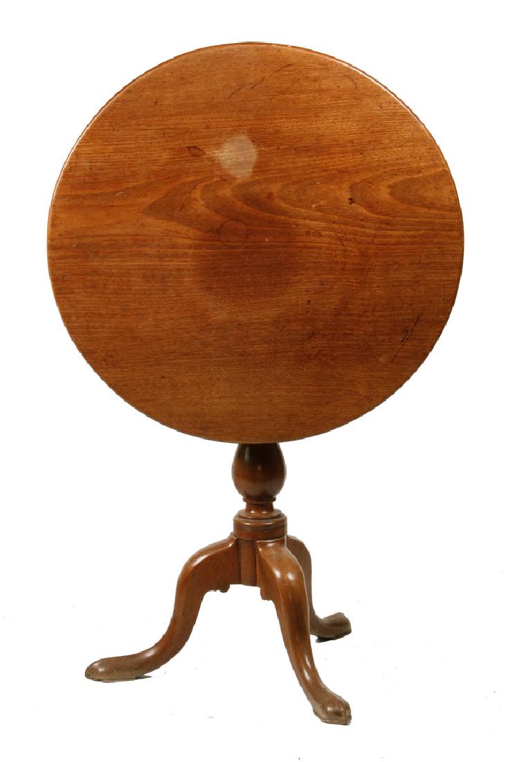 PERIOD QUEEN ANNE TILT TOP TABLE: Circa 1740 Mahogany Round Tilt Top Table with birdcage top for tilt and swivel, ring and urn turned stanchion, resting on substantial arched legs with padded slipper foot, 29" x 28" diam. Good conditi