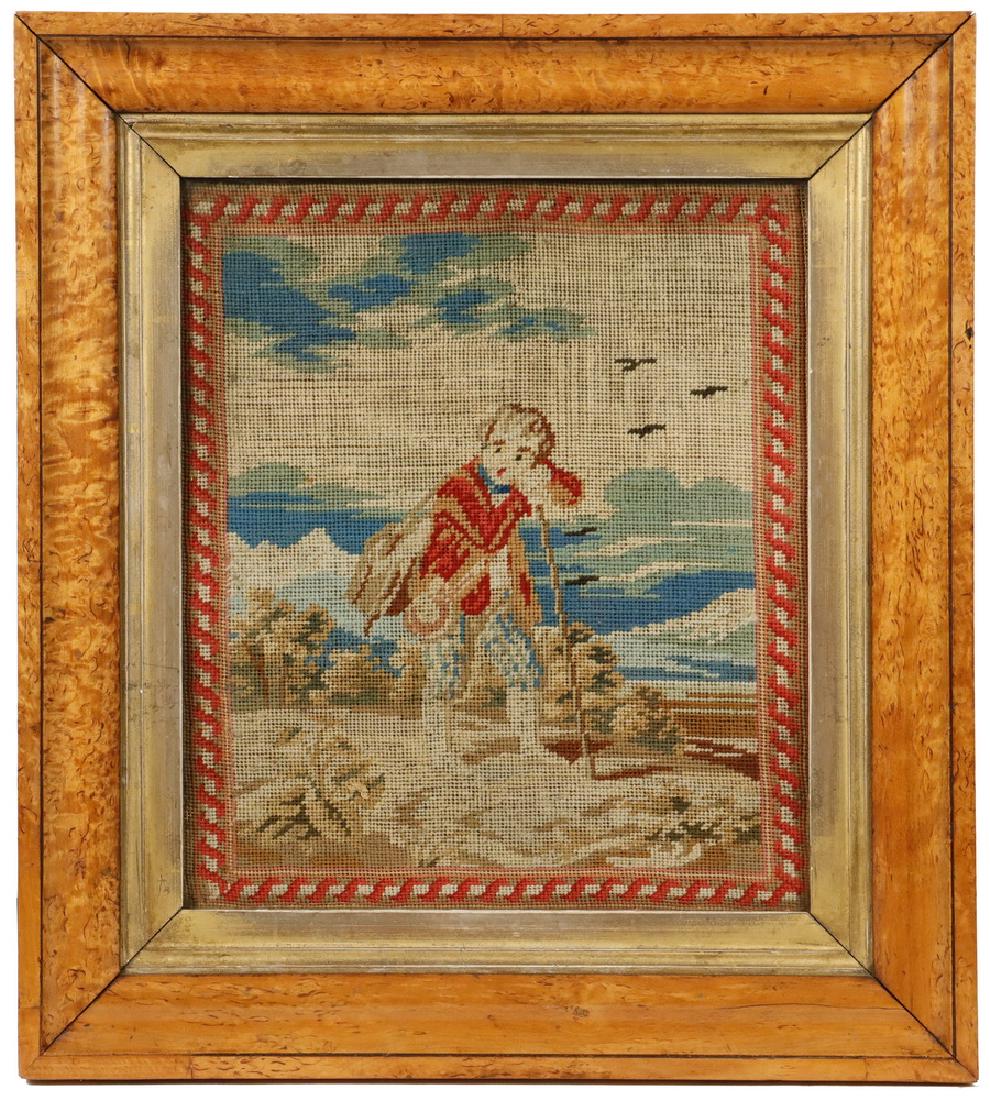 EARLY 19TH C. BRITISH NEEDLEPOINT: Portrait of a Young Traveler in wool petit-point, with an integral 'roped ribbon' red on cream border, circa 1820, in the original bird's-eye maple frame with broad gilt liner, under the old wavy glas