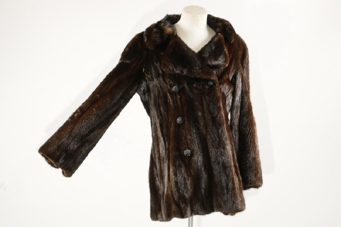 MINK JACKET: Dark Brown Mink Jacket, double breasted button front design with notched collar, front slash pockets, lined in dark brown satin, interior embroidered 'Anita Goldberg', no maker's label, 27" long, 20"
