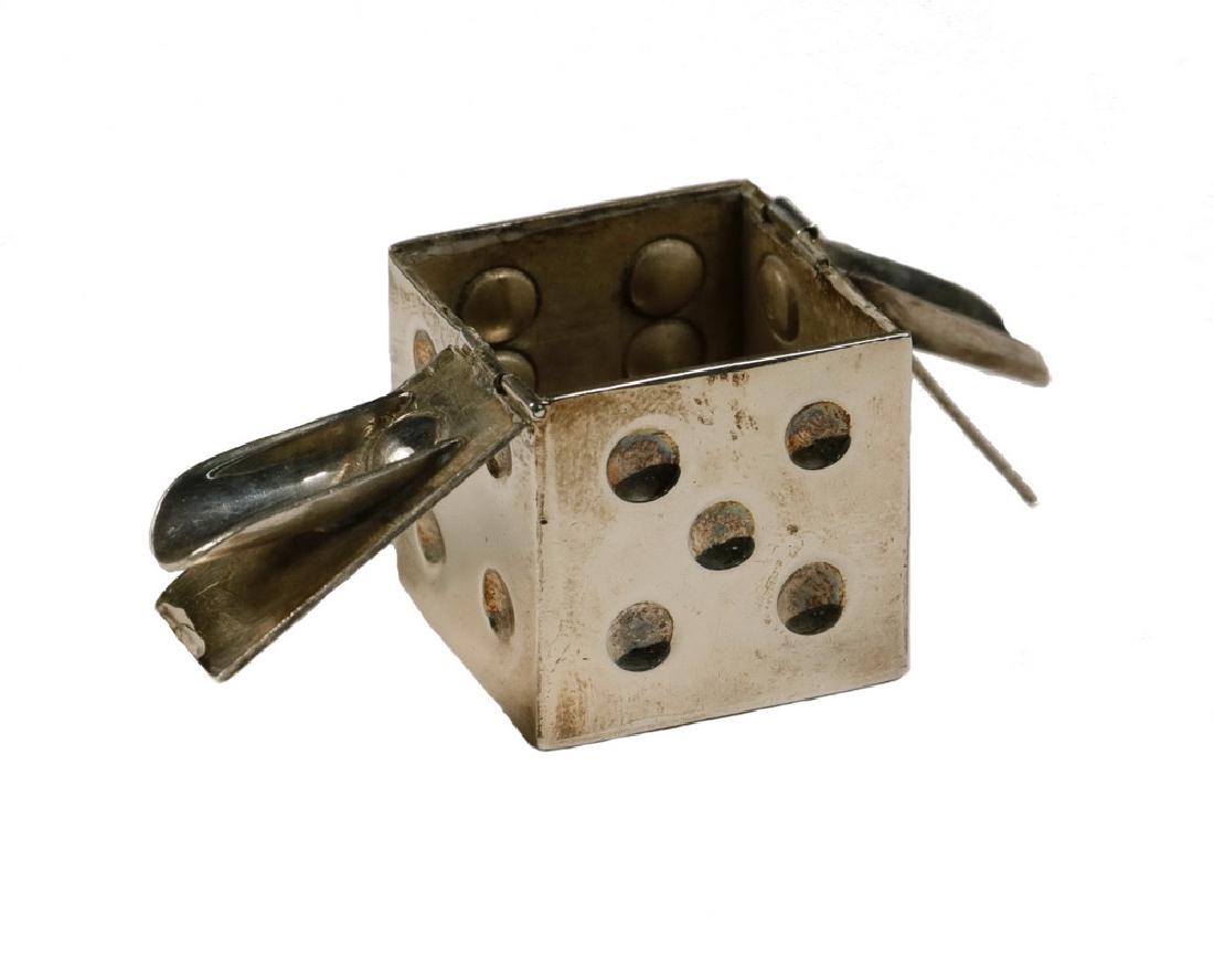 WILLIAM SPRATLING STERLING PORTABLE ASHTRAY: Early 1940s era Taxco, Mexico Sterling Silver Single Dice Form Ashtray by William Spratling, two hinged lids, each concealing a cigarette rest, with circular 'Spratling Silver, Made in Mexico' and 'Sp