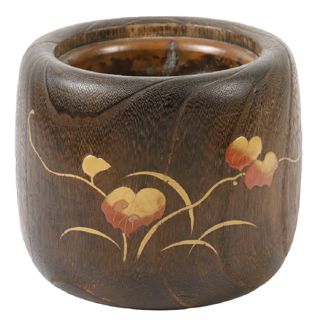 JAPANESE KIRI WOOD HIBACHI BRAZIER: Japanese Meiji Period Kiri Wood Hibachi, early 20th c., with inlaid brass leaf decoration, original copper liner, 6 1/2" high, 7 1/4" diam. Surface corrosion to copper liner, otherwise good condition.