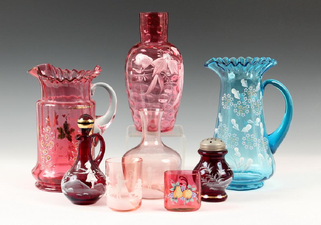 (7 PCS) ENAMELED ART GLASS: Collection of (7) Pieces of Vintage Enameled Art Glass, including: Two-piece Mary Gregory cranberry glass water carafe and tumbler set, with white enameled image of young boy fishing, glass: 3 3/4" hi