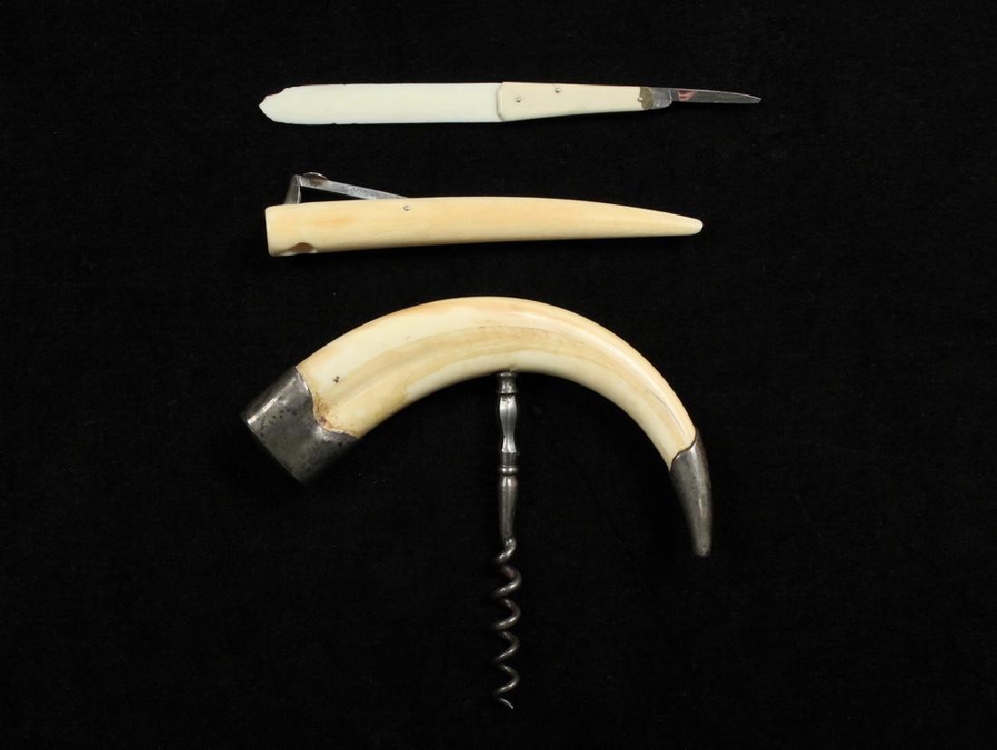 (3) WALRUS OR BOAR TUSK IMPLEMENTS: Late 19th to early 20th c., including: Silver Fitted Boar's Tusk Cork Screw with engraved 'N' monogram, no maker's mark, 6 1/2" x 5 3/4"; PLUS Cigar Cutter from small walrus tusk, with sterling silver