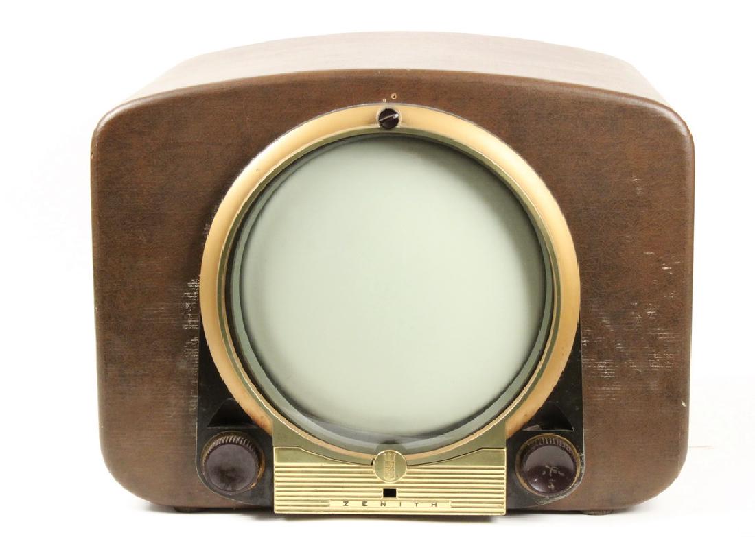 VINTAGE ZENITH TV SET: Circa 1950 Zenith Television with Round Screen, Model G2327R7, leatherette type surface, no stand, 17 1/2" high, 22" x 20", 12" diam. screen. Working condition not assessed, side cover missing, surfac