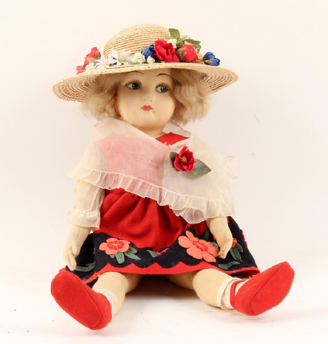 LENCI ITALIAN FELT DOLL: Vintage Italian Made Lenci Girl Doll, circa 1930s, with felt body and original felt clothing, straw hat, jointed arms and legs and neck, painted face with side glancing eyes, sewn on mohair hair, unma