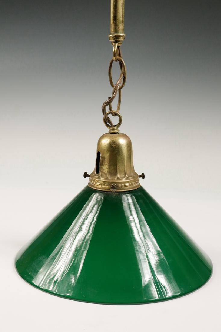 BRASS PENDANT LIGHT WITH CASED SHADE: Early 20th c. Brass Hanging Pendant Light Fixture, with green cased glass shade, rewired, 17 1/4" high (incl. shade), 9 3/4" diam. A few small dents in ceiling cap.