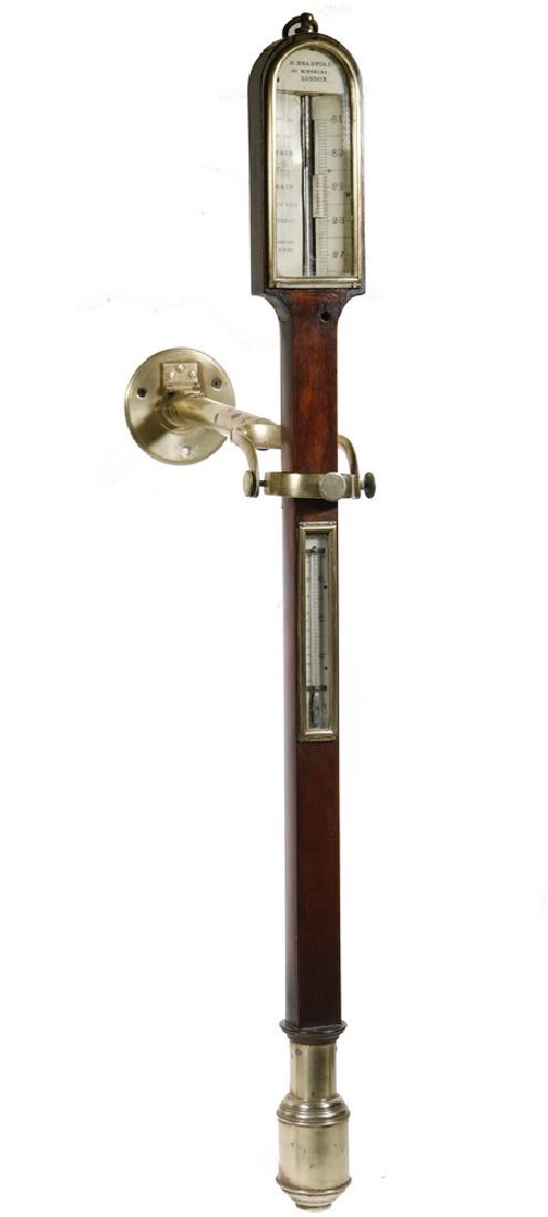 19TH C. ENGLISH MARINE STICK BAROMETER: Rosewood and Brass Stick "Improved Marine" Barometer with sturdy brass gimbal, marked "G. Bradford, 99 Minories, London", circa 1830, barometer with intact scale indicator, tube and brass port, thermo