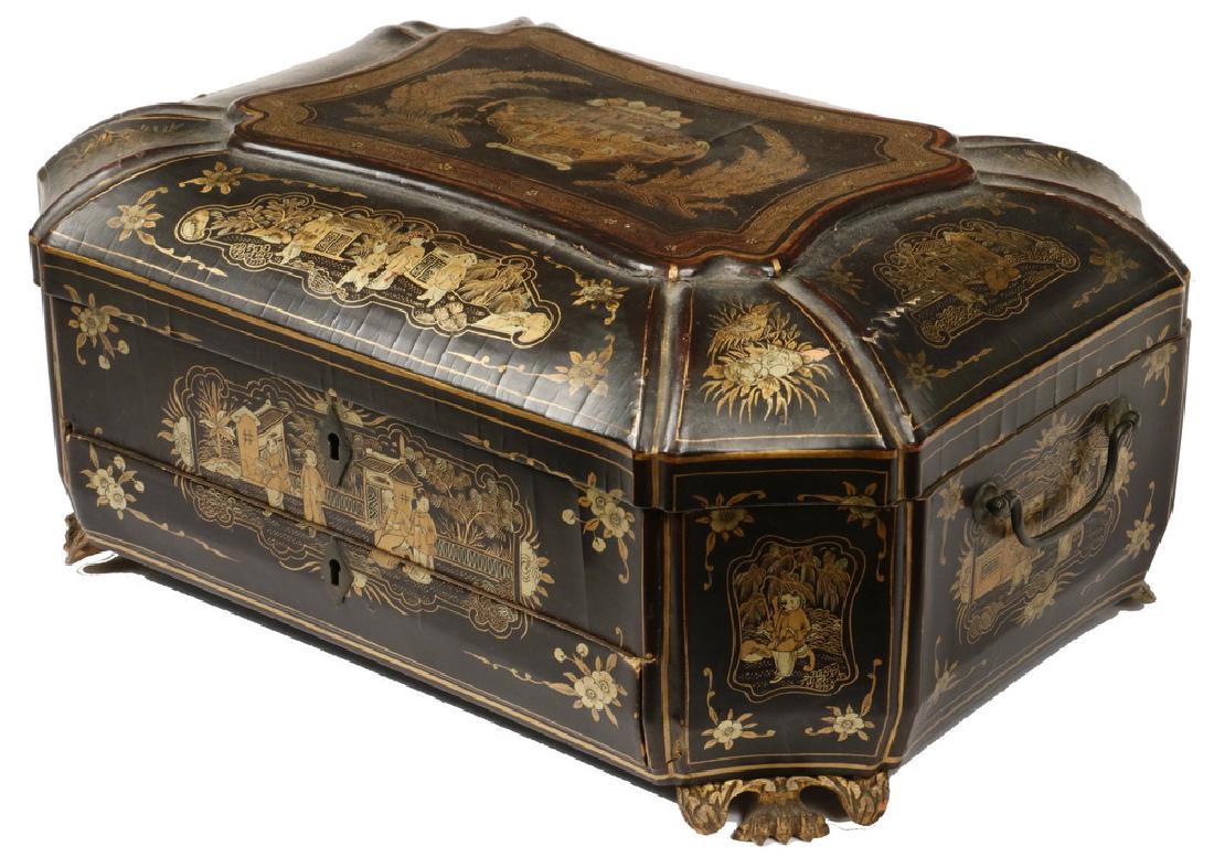 CHINESE EXPORT SEWING BOX: 19th c. Chinese Export Lacquered Papier Mache Sewing Box, paneled sides with gold and enamel decorated figural and floral scenes, two swing side handles, set on four paw form feet, interior contains l