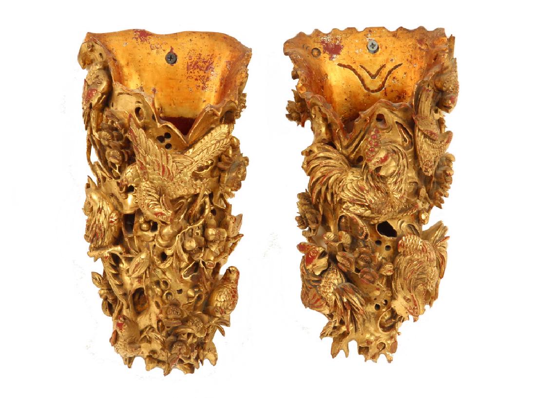 PAIR CHINESE CARVED WALL POCKETS: Pair of 19th c. Chinese Carved and Gilded Wood Wall Pockets, one with three-dimensional depictions of cockerels and other birds among branches and leaves, the other with birds and insects among flower