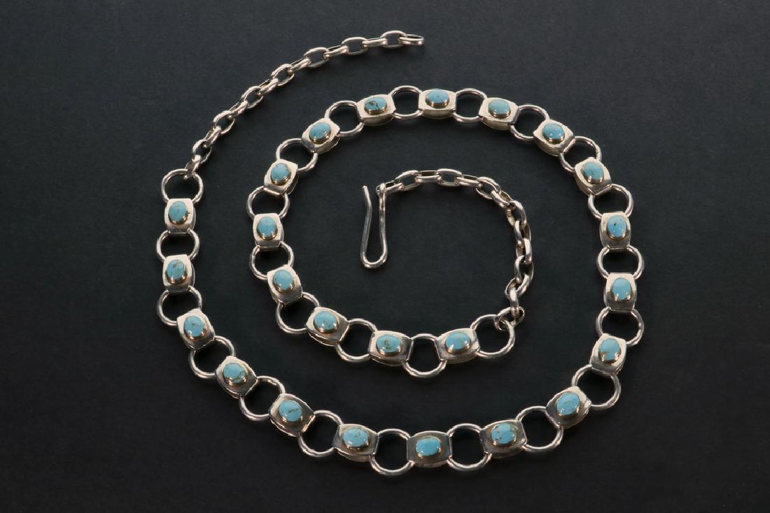 JIMMY CALABAZA STERLING & TURQUOISE BELT: Native American Sterling Silver Link Belt Crafted by Jimmy Calabaza (Kewa, Santo Domingo Pueblo), with alternating ring and rectangular links, rectangular links set with an oval cabochon turquoise sto