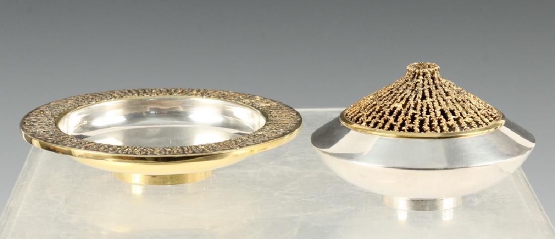 (2) STUART DEVLIN STERLING OBJECTS: (2) Pieces of Sterling and Parcel Gilt Silver by Stuart Devlin, hallmarked for London, 1973, including: Two-piece sculptural bud or stem vase, 2 3/4" high, 4 1/4" diam.; and Low bowl with gilded openw