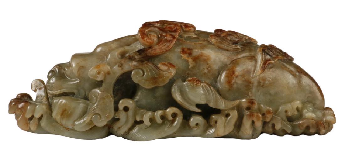 JAPANESE MEIJI JADE RECLINING SEA DRAGON: Moss Jade Carving of Dragon Lying in Wait, sheltered with bats and lingzhi among wind and wave, having a whirlpool underside, 7" long. Very good condition.