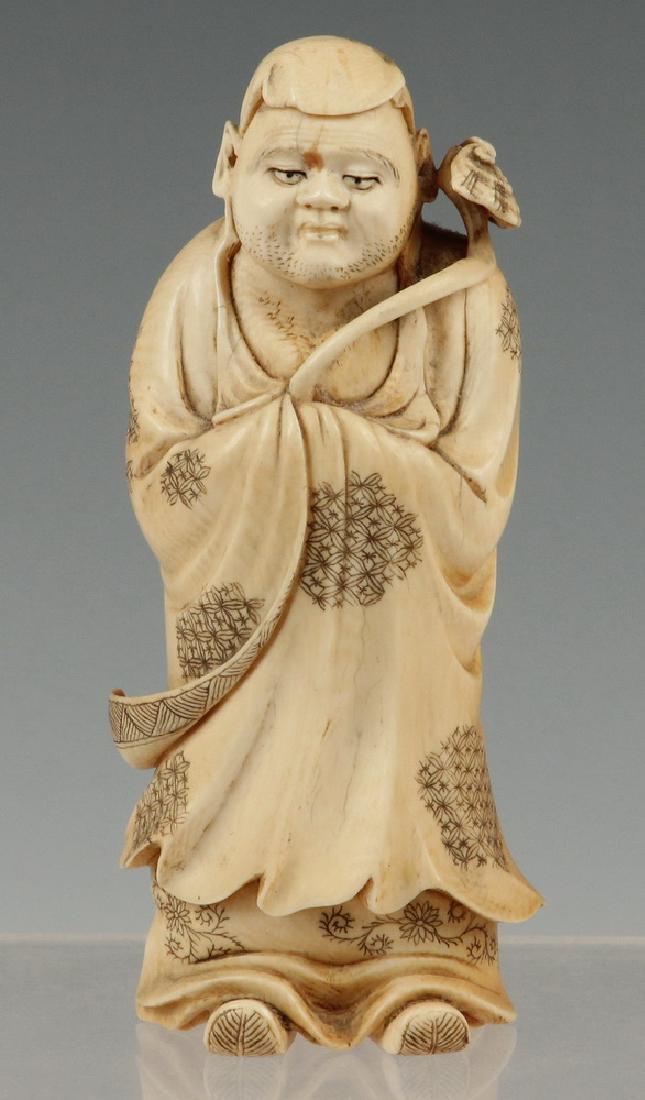 19TH C. JAPANESE CABINET FIGURE: Standing Figure of a Hooded Buddhist Monk holding a Ruyi sceptre in his robed hands, signature block missing from the finished underside, 5 5/8" tall. Small stain to brow, fine shrinkage cracks.