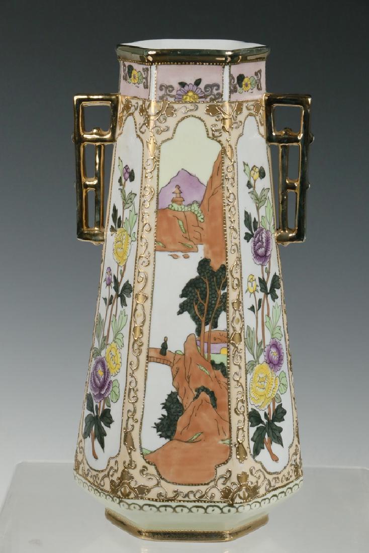 JAPANESE HAND PAINTED VASE: Japanese Deco Era Hand Painted Two-Handled Hexagonal Porcelain Vase, unmarked but probably Nippon or Noritake, with alternating floral and landscape decorated handles surrounded the body, gilded handl