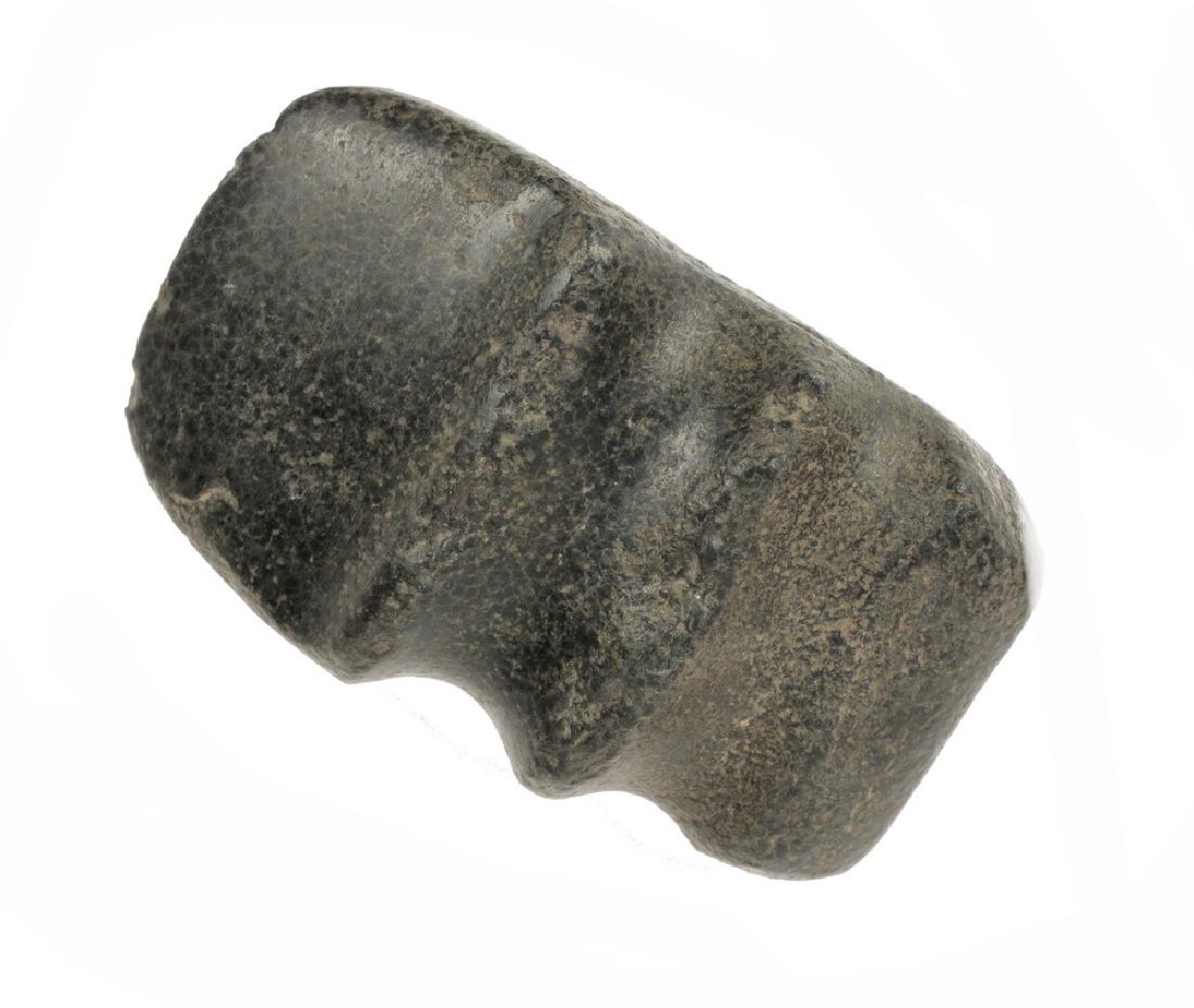 NEOLITHIC NATIVE AMERICAN AXE HEAD: Keokuk Type Notched Axe Head in black quartzite, probably Ohio or upper Mississippi valley, 5" long. Portion of butt gone, chip to edge and notch ridge, retaining some of the polished surface.